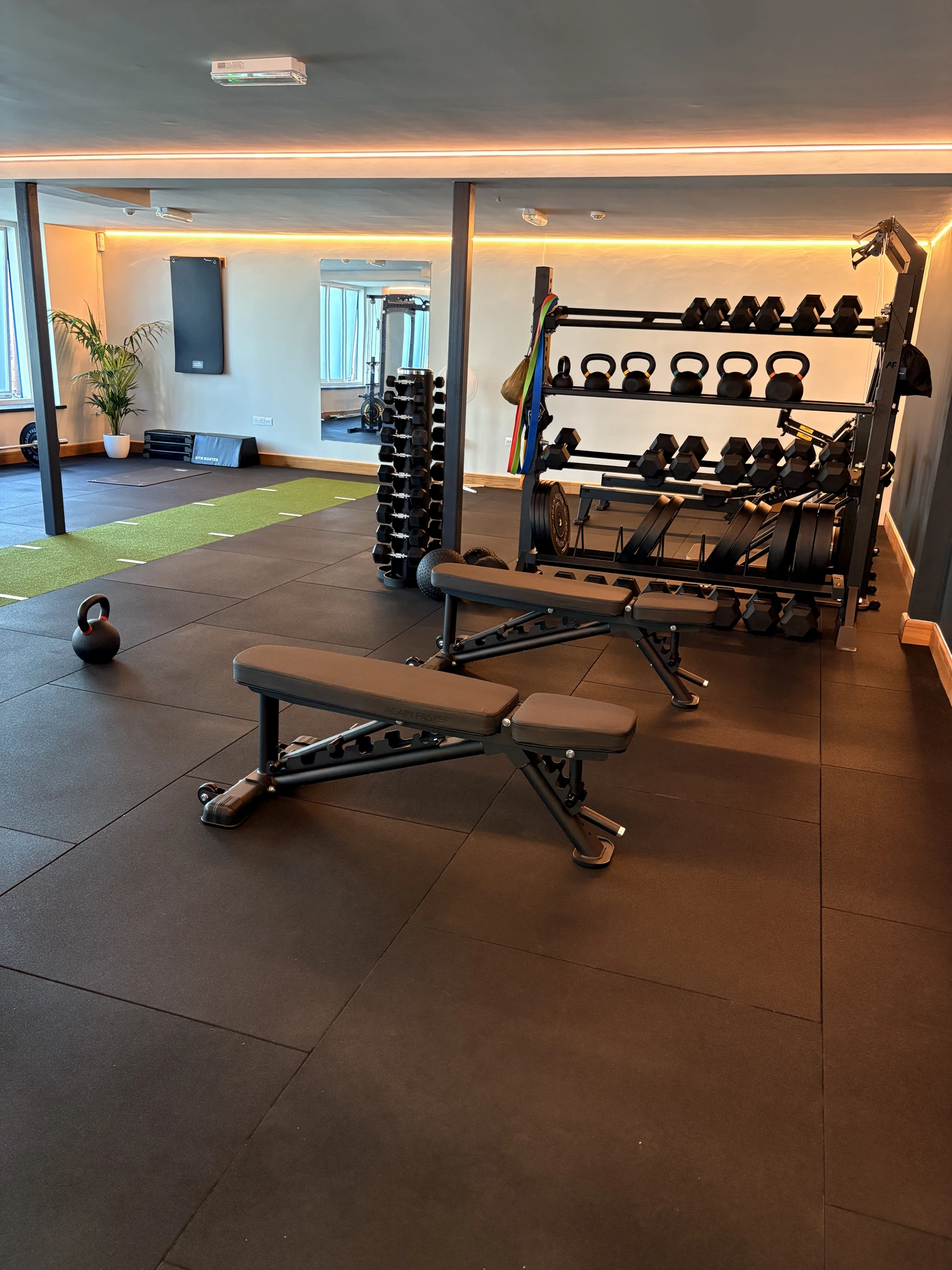Kore Wellbeing bench, dumbbells and studio